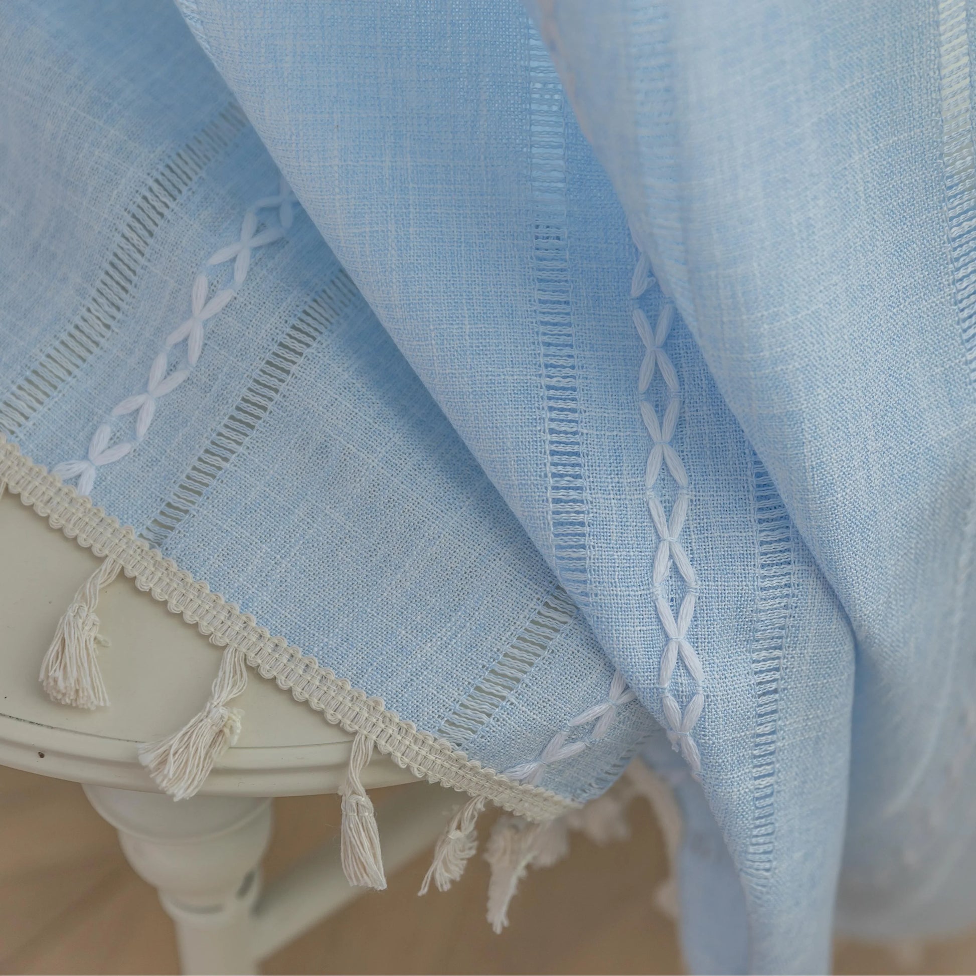 Light Blue Sheer Tassel Curtains – Bring a refreshing, airy charm to your home with these elegant light blue curtains, designed with delicate vertical weave patterns for subtle texture and style. The lightweight, semi-sheer fabric allows natural light to filter through while providing a soft layer of privacy. Finished with playful tassel edges, these curtains add a touch of coastal, bohemian, or contemporary elegance to any living room, bedroom, or dining area. Perfect for creating a serene and inviting atm