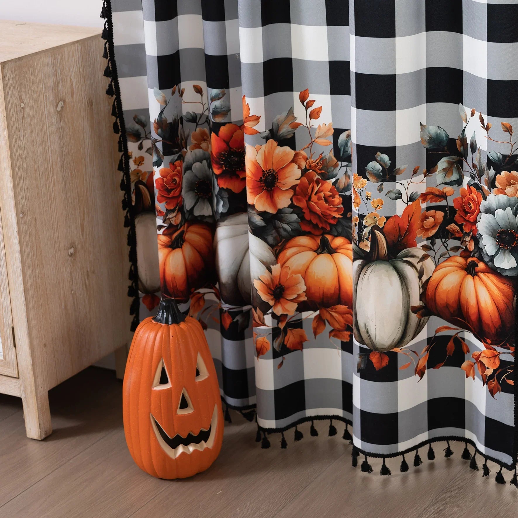 Bring festive charm to your home with this Halloween Curtain featuring black-and-white plaid, pumpkin and floral prints, and “Happy Halloween” design. Perfect seasonal décor for windows.