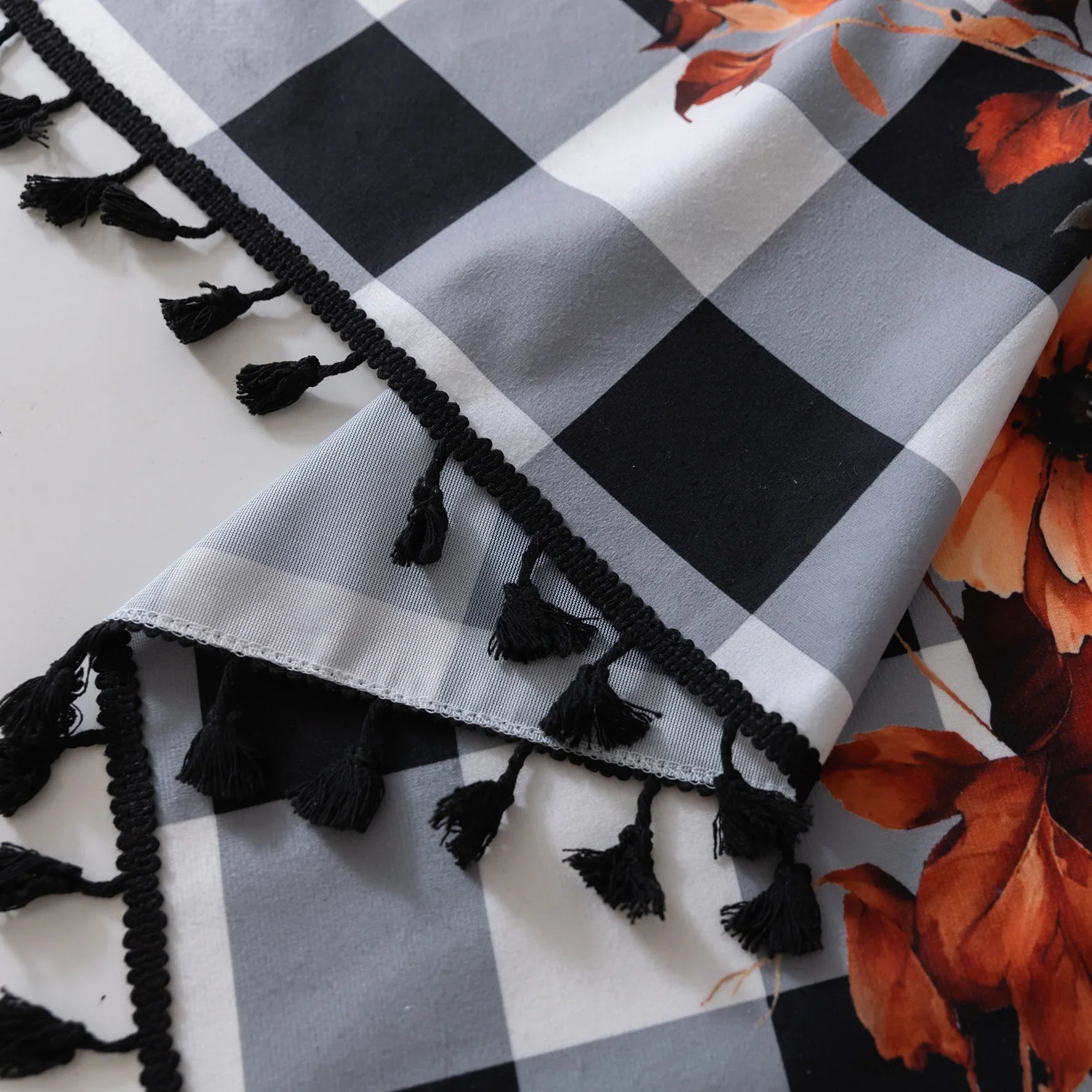 Bring festive charm to your home with this Halloween Curtain featuring black-and-white plaid, pumpkin and floral prints, and “Happy Halloween” design. Perfect seasonal décor for windows.