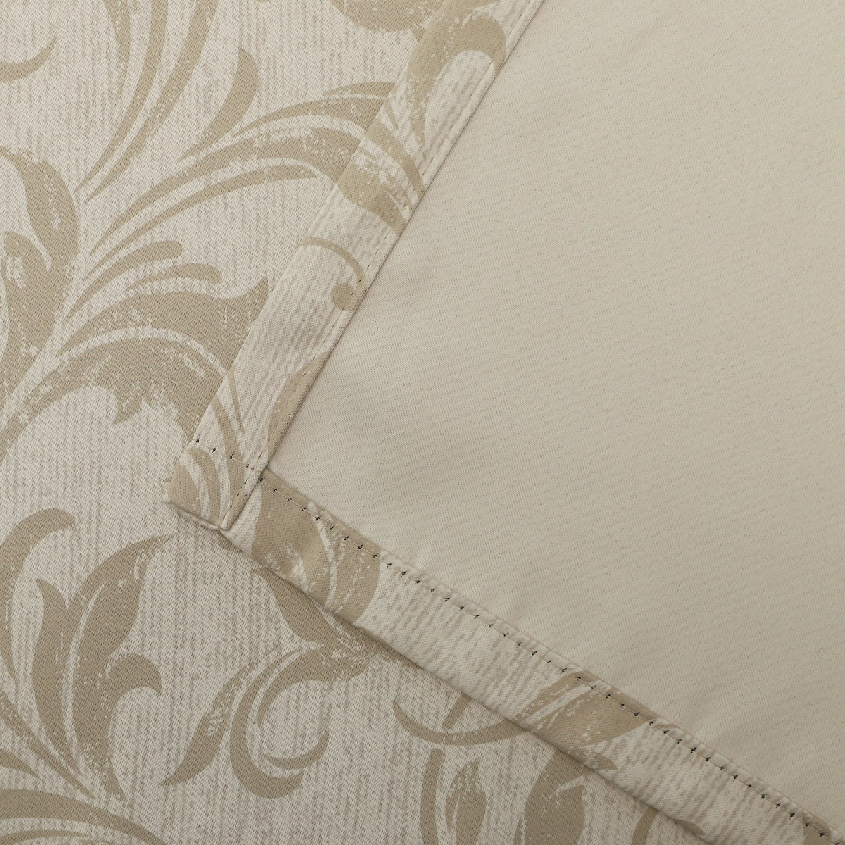 Beige blackout curtain with elegant floral patterns, offering excellent light blocking, enhanced privacy, and a warm, sophisticated look for living rooms, bedrooms, or home offices.