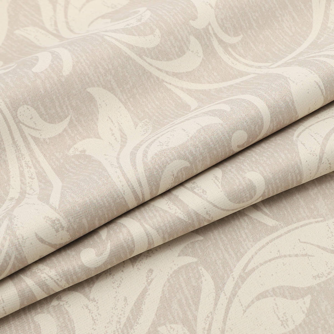 Ivory blackout curtain with delicate floral patterns, designed to block sunlight, ensure privacy, and add a touch of timeless elegance to bedrooms, living rooms, or study spaces.