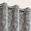 Elegant grey blackout curtain featuring intricate white floral patterns, perfect for blocking sunlight, enhancing privacy, and adding a sophisticated touch to any bedroom, living room, or office décor.