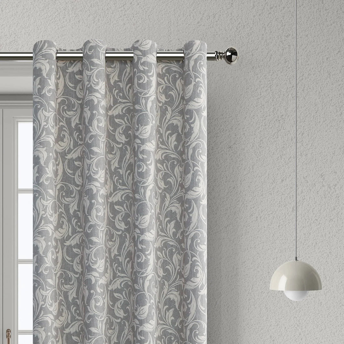 Elegant grey blackout curtain featuring intricate white floral patterns, perfect for blocking sunlight, enhancing privacy, and adding a sophisticated touch to any bedroom, living room, or office décor.