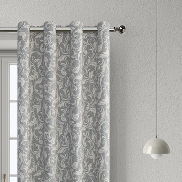 Elegant grey blackout curtain featuring intricate white floral patterns, perfect for blocking sunlight, enhancing privacy, and adding a sophisticated touch to any bedroom, living room, or office décor.