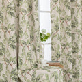 Nature-inspired blackout curtain with lush green leaf prints on a beige background, designed to block sunlight, enhance privacy, and bring a fresh, botanical charm to your living room, bedroom, or dining space.
