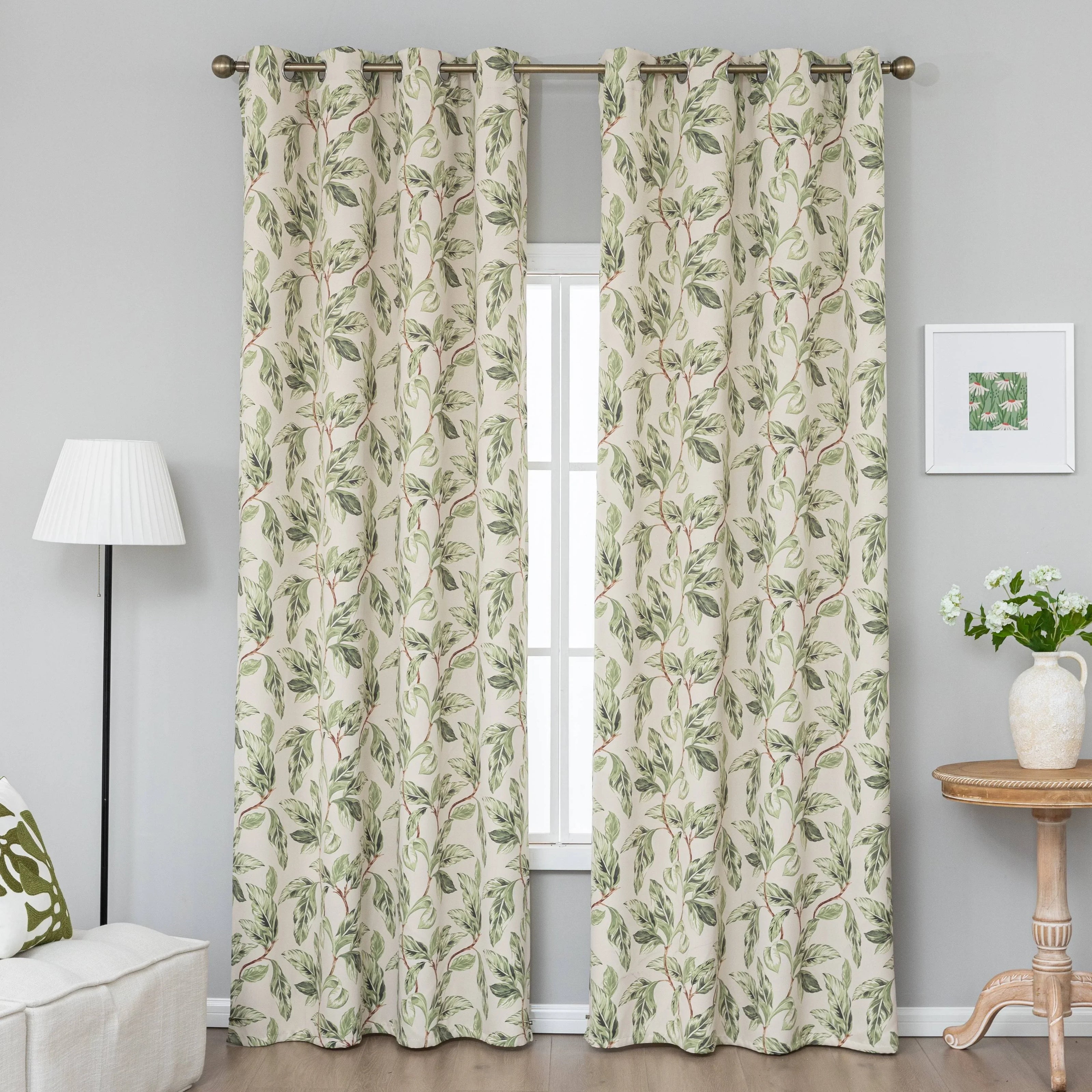 Nature-inspired blackout curtain with lush green leaf prints on a beige background, designed to block sunlight, enhance privacy, and bring a fresh, botanical charm to your living room, bedroom, or dining space.