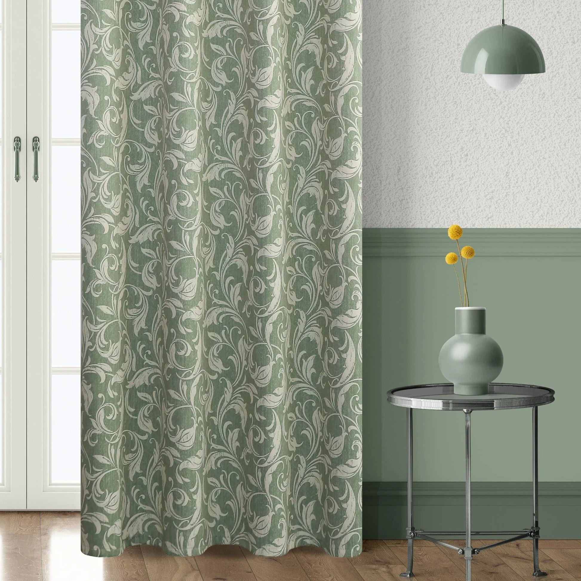 Elegant green blackout curtain with intricate floral vine patterns, offering superior light blocking, privacy, and a fresh, stylish touch for living rooms, bedrooms, or dining areas.