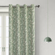Elegant green blackout curtain with intricate floral vine patterns, offering superior light blocking, privacy, and a fresh, stylish touch for living rooms, bedrooms, or dining areas.