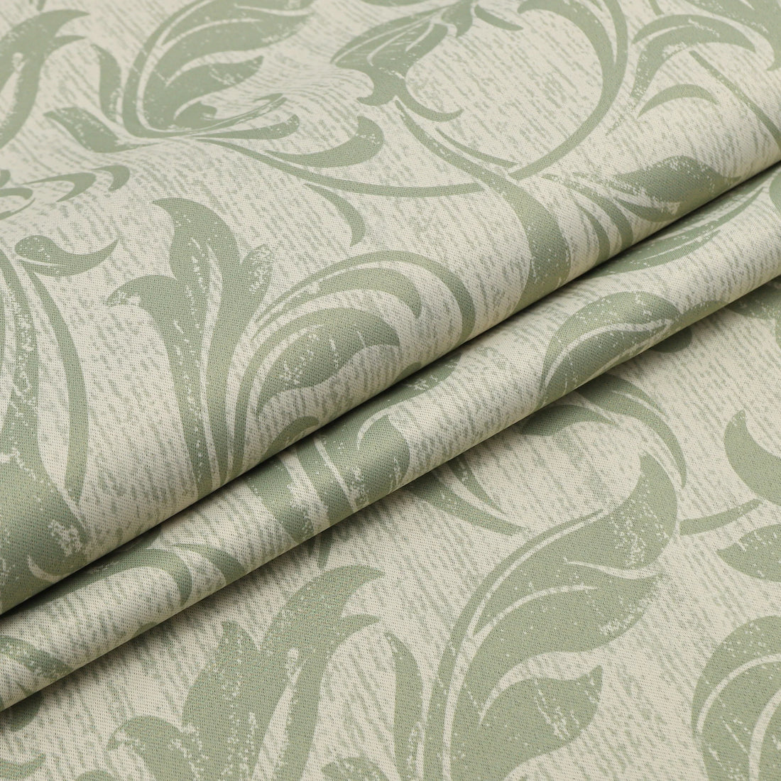 Stylish beige blackout curtain with soft green vine patterns, delivering excellent light blocking and privacy while adding a fresh, elegant touch to living rooms, bedrooms, or dining spaces.