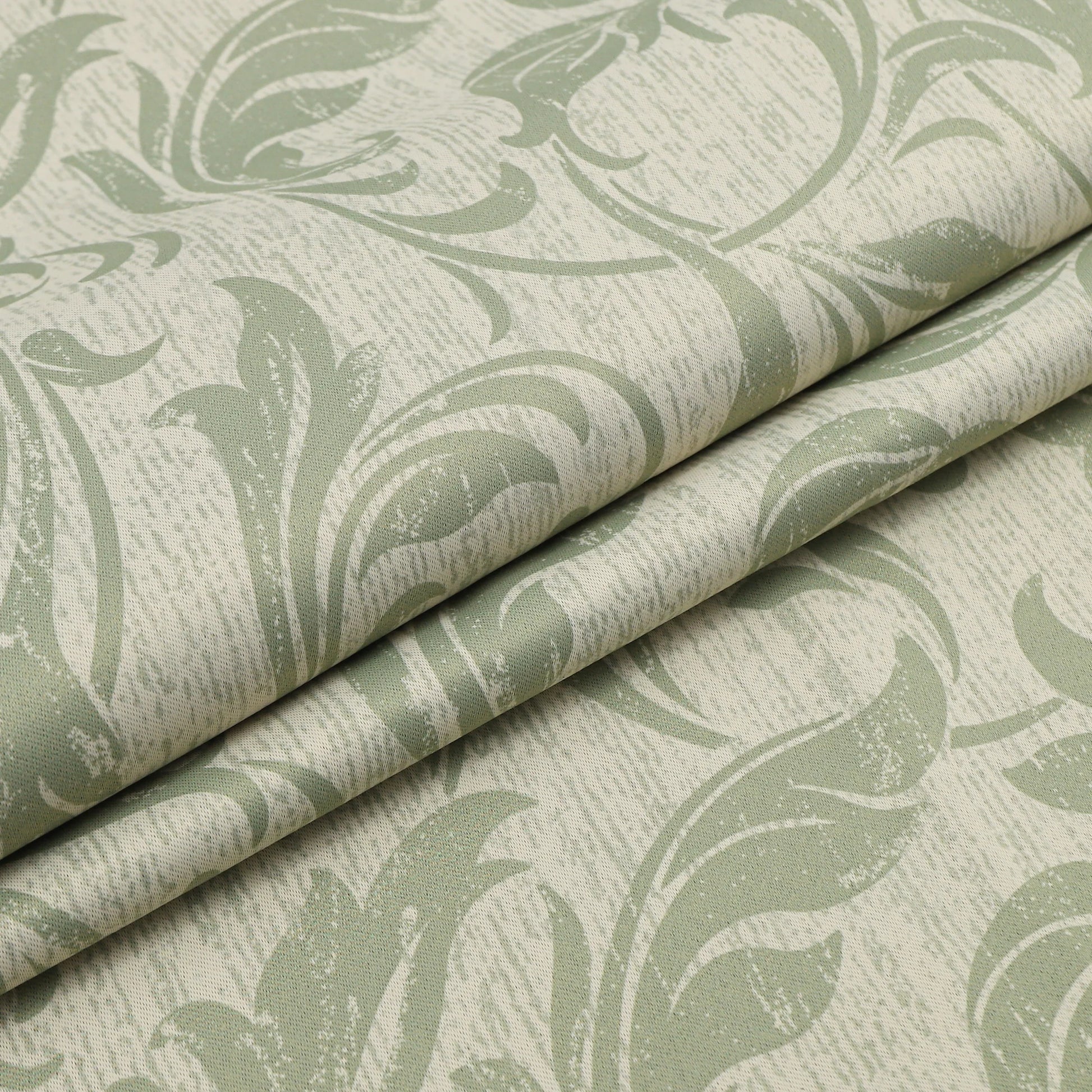 Stylish beige blackout curtain with soft green vine patterns, delivering excellent light blocking and privacy while adding a fresh, elegant touch to living rooms, bedrooms, or dining spaces.