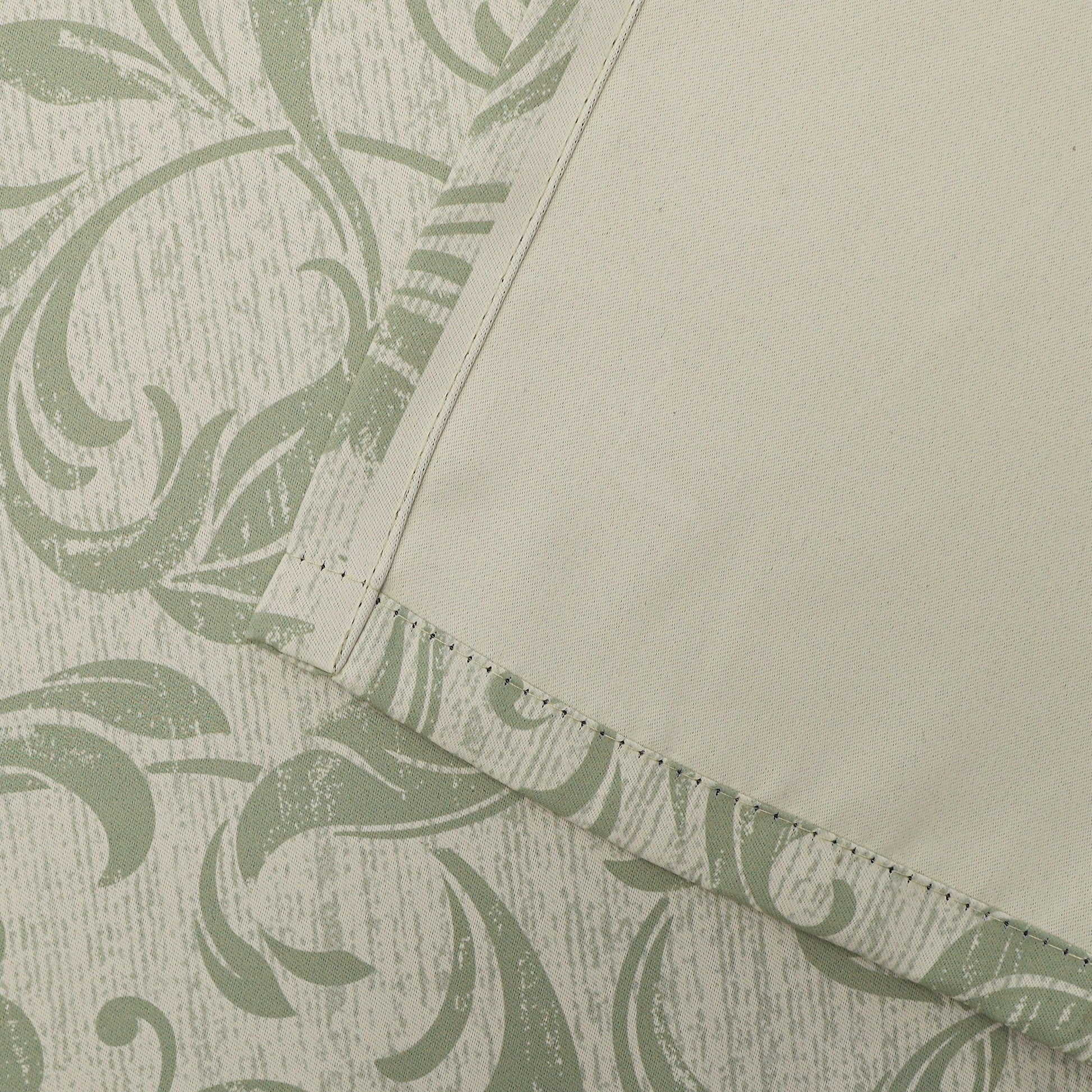 Stylish beige blackout curtain with soft green vine patterns, delivering excellent light blocking and privacy while adding a fresh, elegant touch to living rooms, bedrooms, or dining spaces.