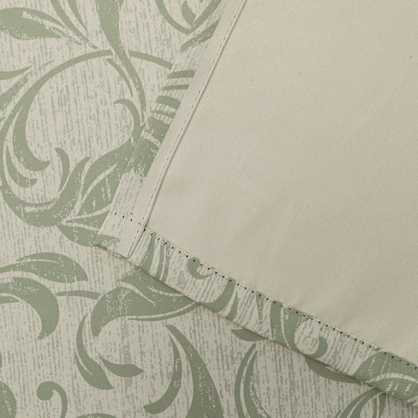 Stylish beige blackout curtain with soft green vine patterns, delivering excellent light blocking and privacy while adding a fresh, elegant touch to living rooms, bedrooms, or dining spaces.