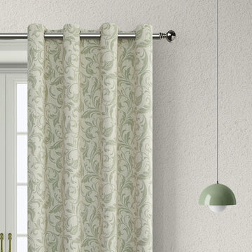 Stylish beige blackout curtain with soft green vine patterns, delivering excellent light blocking and privacy while adding a fresh, elegant touch to living rooms, bedrooms, or dining spaces.