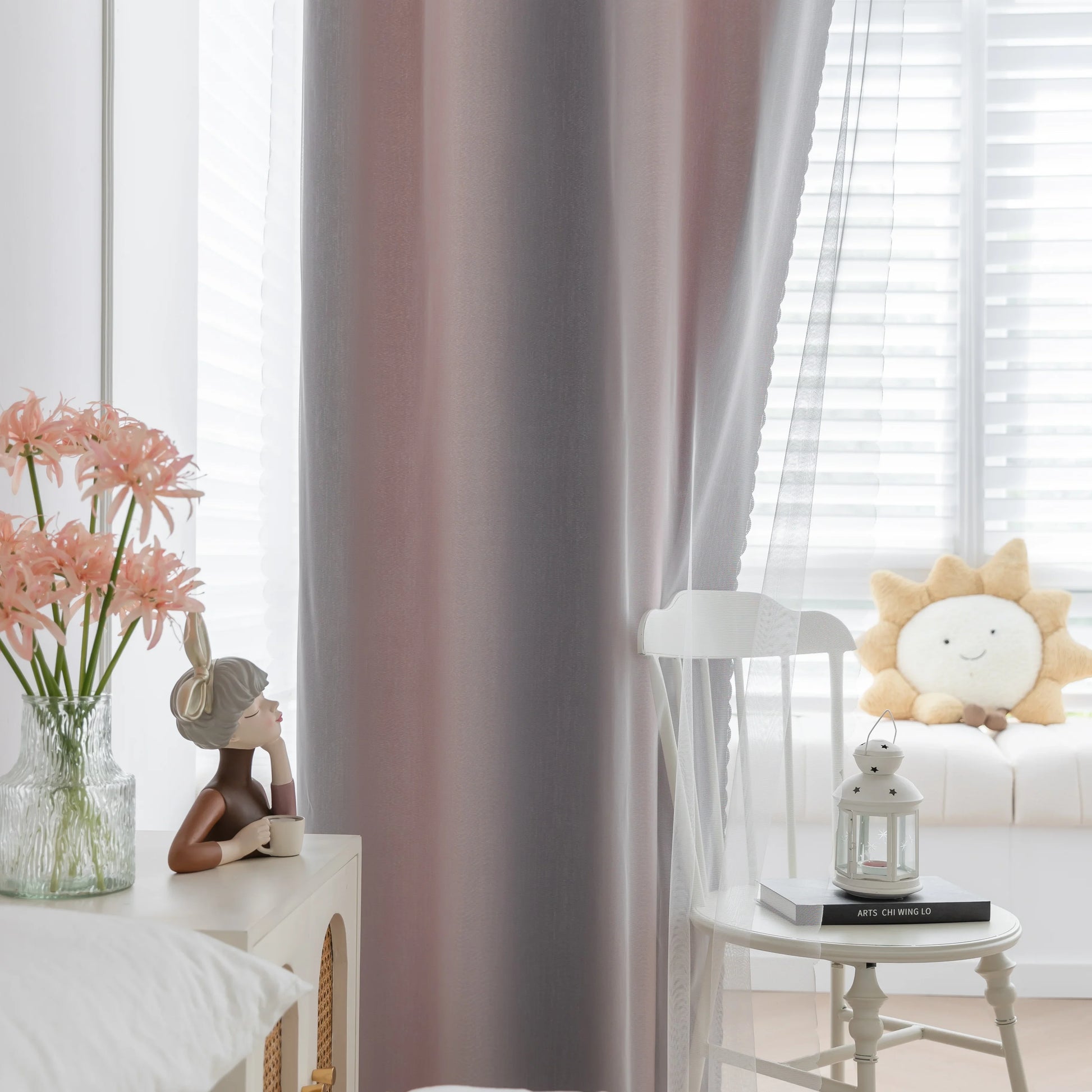 Modern gradient blackout curtain in soft pink and grey tones, offering superior light-blocking and privacy while adding a chic, contemporary touch to your bedroom or living room décor.