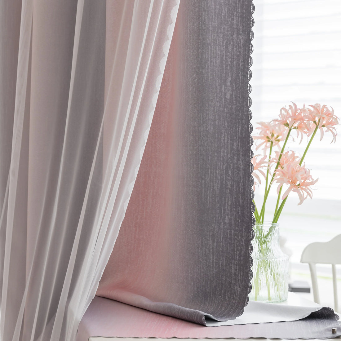 Modern gradient blackout curtain in soft pink and grey tones, offering superior light-blocking and privacy while adding a chic, contemporary touch to your bedroom or living room décor.