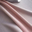 Modern gradient blackout curtain in soft pink and grey tones, offering superior light-blocking and privacy while adding a chic, contemporary touch to your bedroom or living room d¨¦cor.