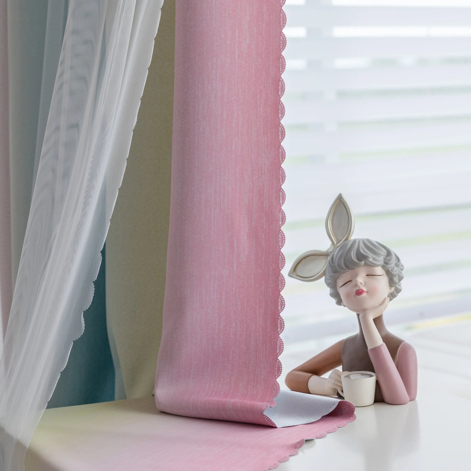 Colorful gradient blackout curtain with soft pink, yellow, and teal hues, designed to block light, enhance privacy, and bring a vibrant, modern charm to any bedroom or living space.