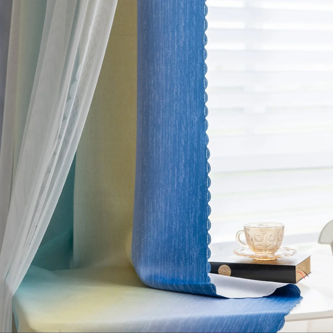 Blue, teal, and yellow gradient blackout curtain with elegant light-blocking fabric, offering privacy, energy efficiency, and a stylish modern touch for bedrooms or living rooms.