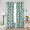 Modern geometric blackout curtain featuring bold teal and green tile-inspired patterns on a cream background, offering stylish decor while blocking sunlight and enhancing privacy.