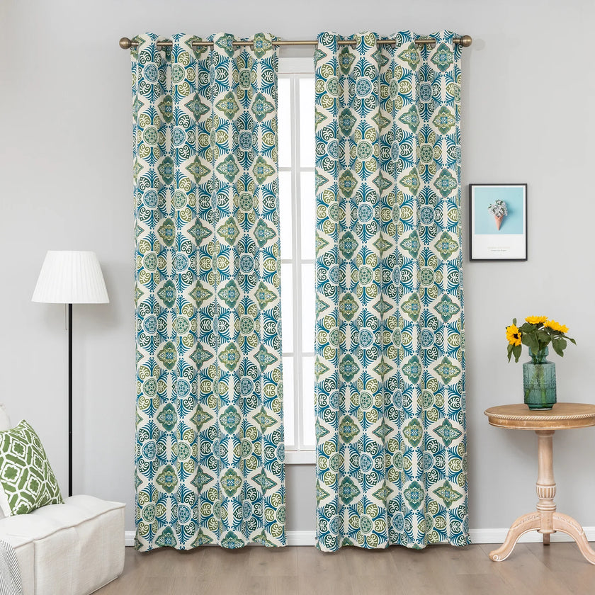 Modern geometric blackout curtain featuring bold teal and green tile-inspired patterns on a cream background, offering stylish decor while blocking sunlight and enhancing privacy.