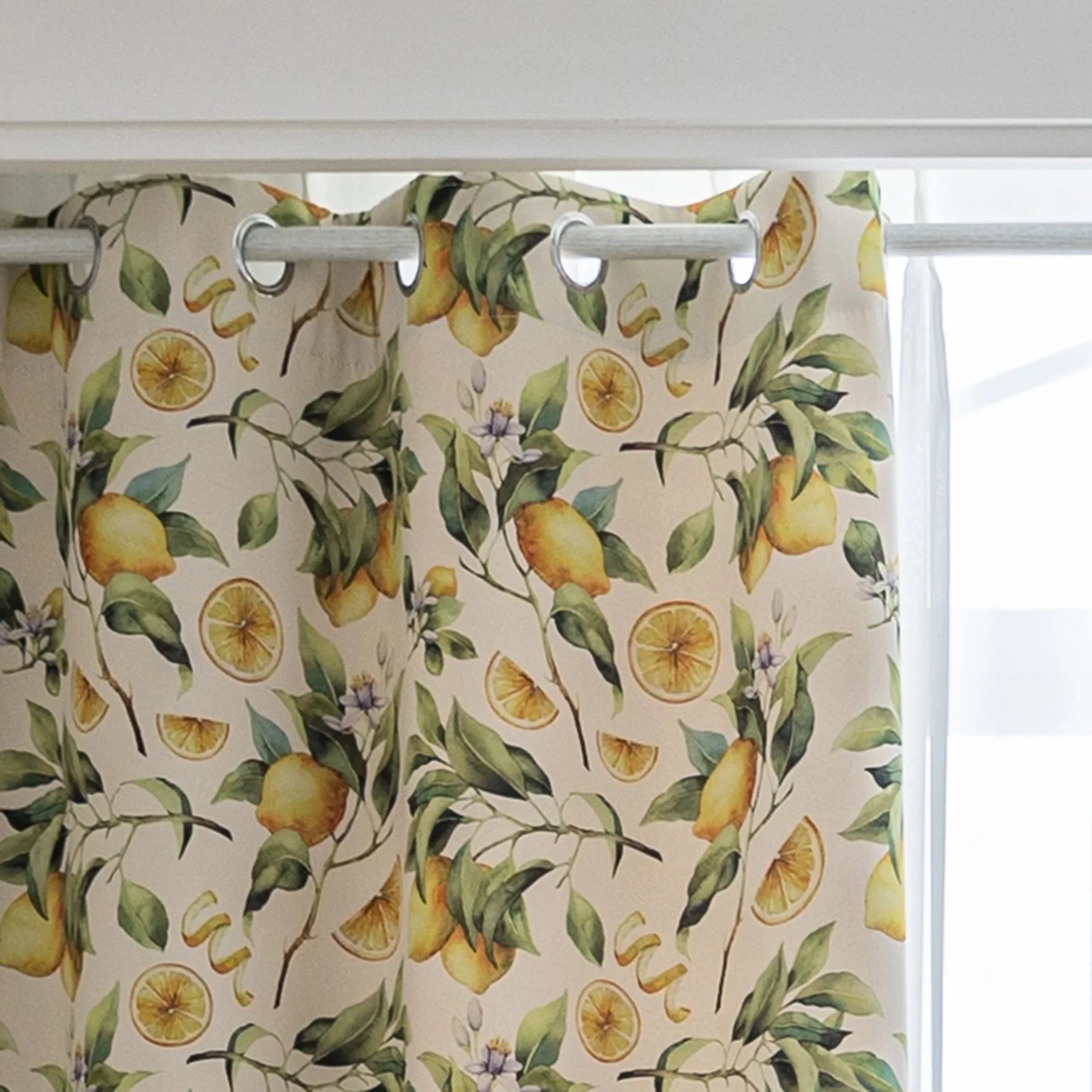 Fresh and vibrant lemon-print blackout curtain featuring lush green leaves and golden citrus fruits, perfect for adding a cheerful Mediterranean touch while blocking sunlight and ensuring privacy in your home.