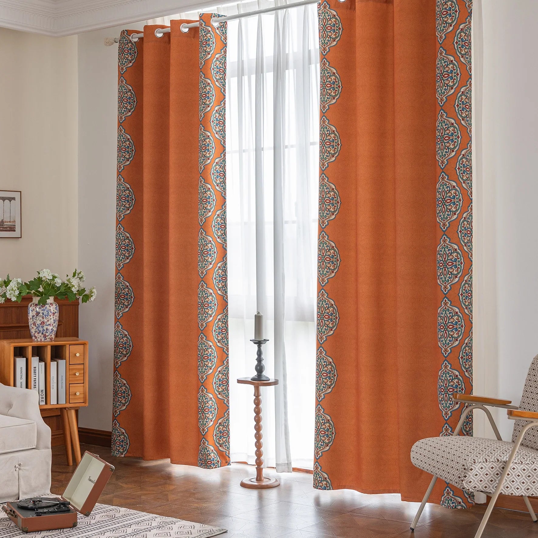 Stylish burnt orange blackout curtain with intricate medallion border design, blending vibrant color with elegant patterns to provide privacy, block sunlight, and enhance any living or bedroom décor.