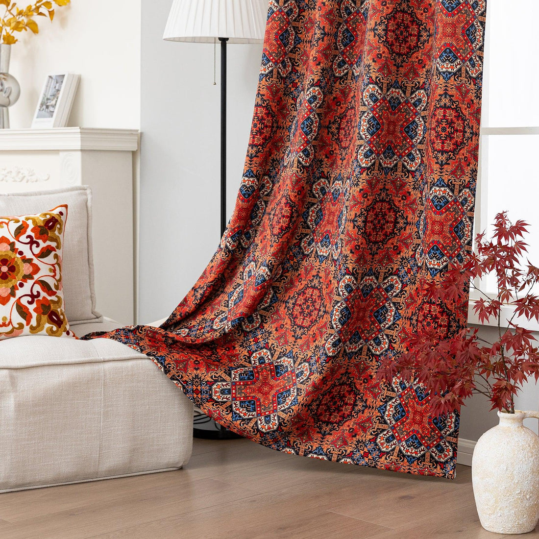 Persian-inspired blackout curtain featuring rich red, navy, and gold tones in an intricate geometric pattern, offering both timeless elegance and effective light-blocking for a warm, stylish home.