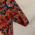 Persian-inspired blackout curtain featuring rich red, navy, and gold tones in an intricate geometric pattern, offering both timeless elegance and effective light-blocking for a warm, stylish home.