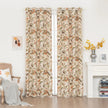 Vintage floral blackout curtain with warm orange and green tones on a beige background, combining classic charm with effective light-blocking and privacy for a cozy home atmosphere.
