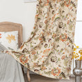 Vintage floral blackout curtain with warm orange and green tones on a beige background, combining classic charm with effective light-blocking and privacy for a cozy home atmosphere.