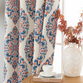 Elegant blackout curtain with blue and orange damask patterns on a cream background, offering stylish light-blocking and privacy for any room.
