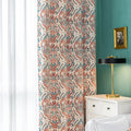 Elegant bohemian blackout curtain with intricate red and teal floral patterns on a soft beige background, designed to block sunlight, reduce noise, and add artistic charm to any room.