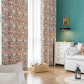 Elegant bohemian blackout curtain with intricate red and teal floral patterns on a soft beige background, designed to block sunlight, reduce noise, and add artistic charm to any room.