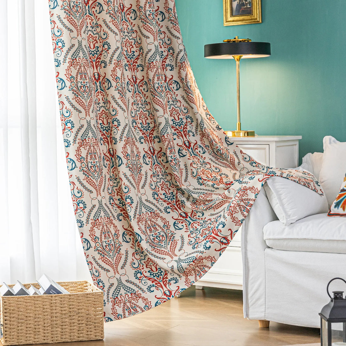 Elegant bohemian blackout curtain with intricate red and teal floral patterns on a soft beige background, designed to block sunlight, reduce noise, and add artistic charm to any room.