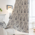 Stylish blackout curtain with an elegant dark floral damask pattern on a neutral beige background, offering excellent light-blocking, privacy, and a timeless touch for modern and classic interiors.