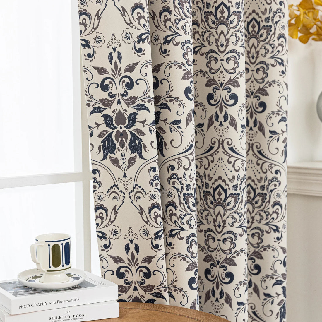 Stylish blackout curtain with an elegant dark floral damask pattern on a neutral beige background, offering excellent light-blocking, privacy, and a timeless touch for modern and classic interiors.