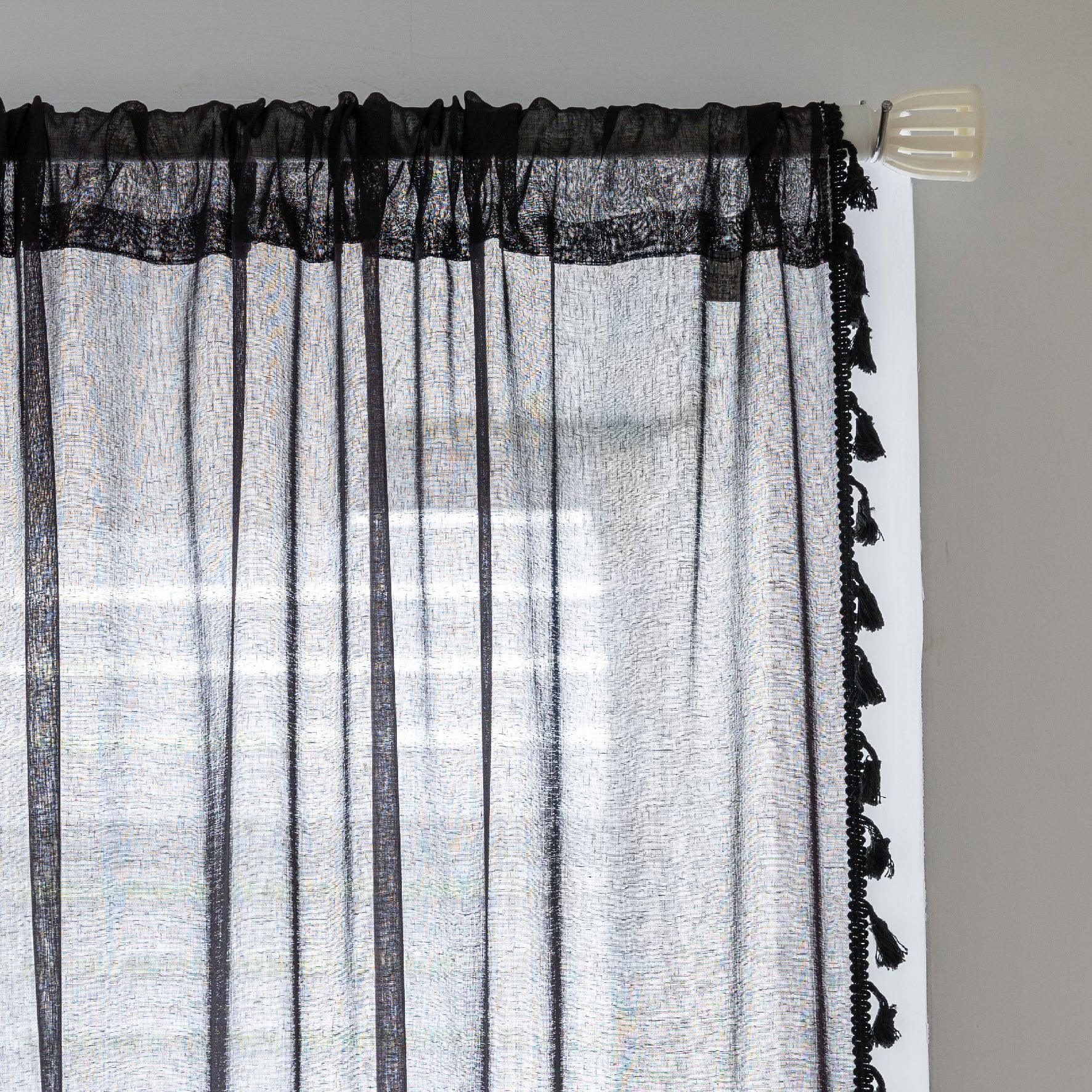 Black Sheer Curtains with Pom Pom Trim – Add modern elegance and soft light control to your space with these lightweight black sheer curtains, featuring a stylish pom pom edge for a chic decorative accent. Perfect for living rooms, bedrooms, or reading nooks, they gently filter sunlight while maintaining privacy, creating a cozy yet sophisticated atmosphere. Easy to match with contemporary or classic décor, these breathable curtains enhance your home with a touch of refined charm.
