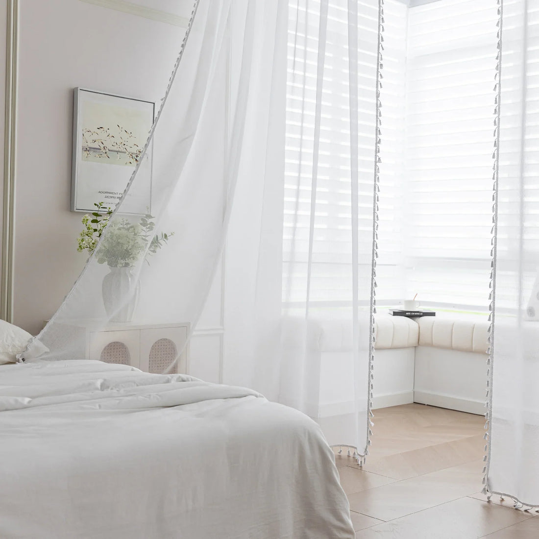 White Sheer Curtains with Pom Pom Trim – Create an airy, elegant atmosphere with these lightweight white sheer curtains, featuring delicate pom pom edging for a subtle decorative touch. Perfect for softening natural light while maintaining privacy, they add a fresh and cozy feel to bedrooms, living rooms, or reading nooks. Easy to pair with any décor style, these breathable and stylish curtains enhance your space with effortless charm.
