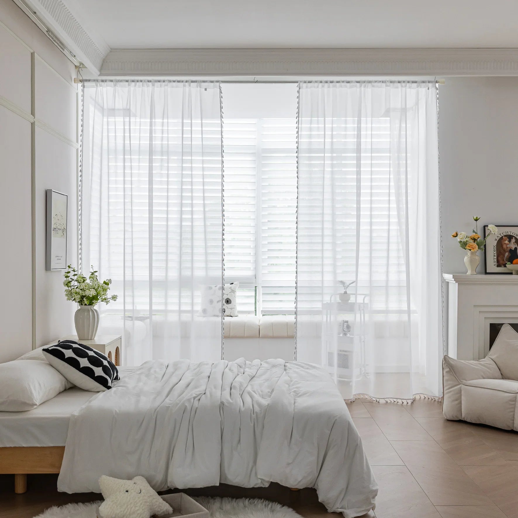 White Sheer Curtains with Pom Pom Trim – Create an airy, elegant atmosphere with these lightweight white sheer curtains, featuring delicate pom pom edging for a subtle decorative touch. Perfect for softening natural light while maintaining privacy, they add a fresh and cozy feel to bedrooms, living rooms, or reading nooks. Easy to pair with any décor style, these breathable and stylish curtains enhance your space with effortless charm.
