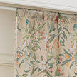Beige floral curtain with colorful botanical patterns in green, orange, pink, and white, featuring elegant tassel trim on the edge, ideal for adding a fresh, nature-inspired touch to home d¨¦cor.