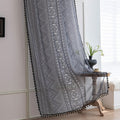 Modern Black and White Geometric Sheer Curtains – Enhance your home with these contemporary sheer curtains featuring an intricate tribal-inspired geometric pattern in black and white. The lightweight fabric allows natural light to filter through while maintaining a sense of privacy, making them perfect for living rooms, bedrooms, or minimalist interiors. Finished with delicate black tassels along the edges, these curtains add a stylish yet subtle decorative touch that complements modern, boho, or Scandinavi