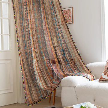 Bring warmth and character to your space with this bohemian tribal-patterned sheer curtain, featuring rich earth tones, geometric motifs, and colorful tassel trim. Crafted from lightweight, breathable fabric, it softly filters sunlight to create a cozy and inviting ambiance while maintaining privacy.