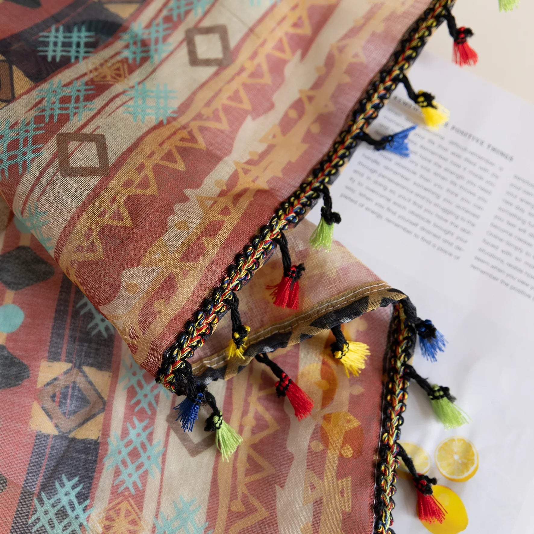 Bring warmth and character to your space with this bohemian tribal-patterned sheer curtain, featuring rich earth tones, geometric motifs, and colorful tassel trim. Crafted from lightweight, breathable fabric, it softly filters sunlight to create a cozy and inviting ambiance while maintaining privacy.