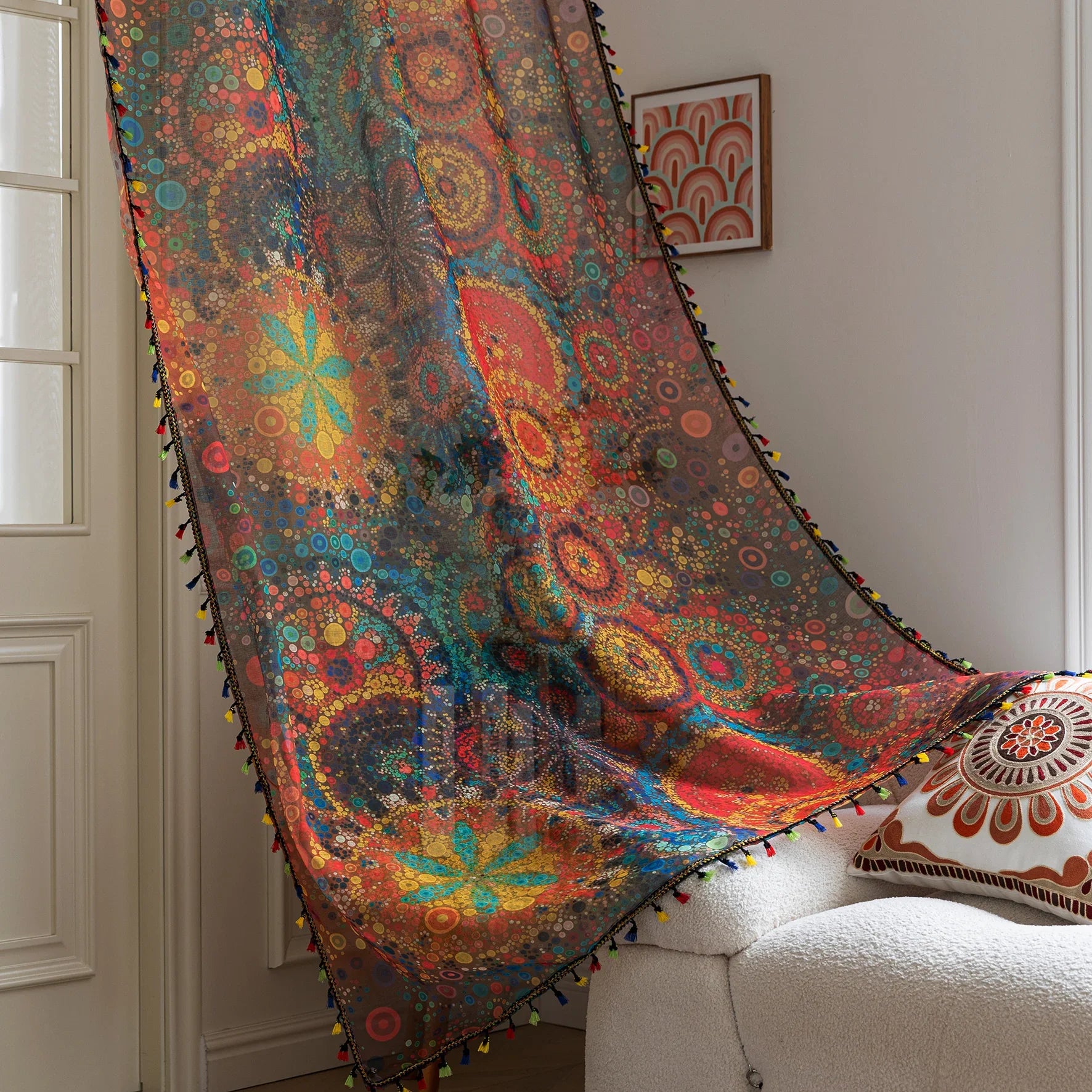Infuse your home with artistic vibrance using this bohemian sheer curtain, adorned with an intricate mandala and floral pattern in bold reds, yellows, blues, and oranges. Made from lightweight, airy fabric, it filters natural sunlight beautifully while preserving privacy. Perfect for living rooms, bedrooms, or creative spaces, this decorative curtain creates a warm, inviting ambiance.