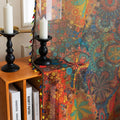 Infuse your home with artistic vibrance using this bohemian sheer curtain, adorned with an intricate mandala and floral pattern in bold reds, yellows, blues, and oranges. Made from lightweight, airy fabric, it filters natural sunlight beautifully while preserving privacy. Perfect for living rooms, bedrooms, or creative spaces, this decorative curtain creates a warm, inviting ambiance.