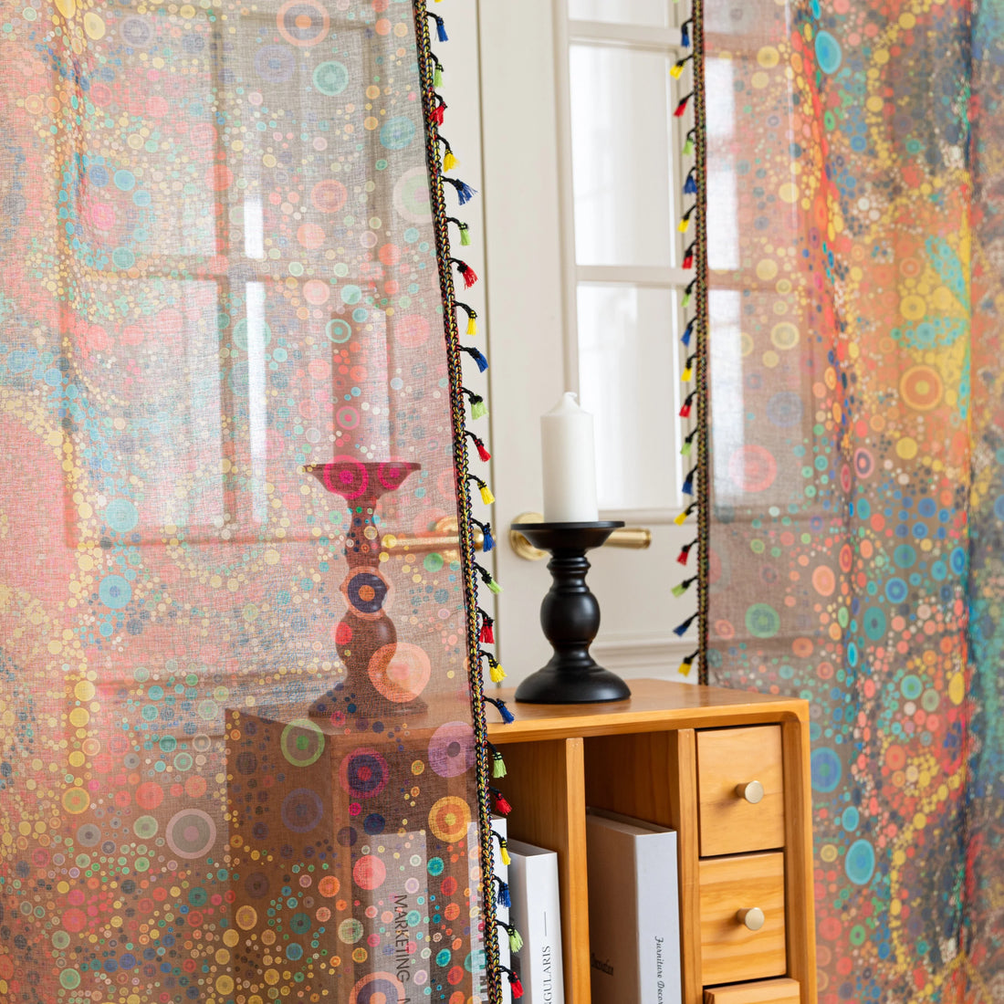 Infuse your home with artistic vibrance using this bohemian sheer curtain, adorned with an intricate mandala and floral pattern in bold reds, yellows, blues, and oranges. Made from lightweight, airy fabric, it filters natural sunlight beautifully while preserving privacy. Perfect for living rooms, bedrooms, or creative spaces, this decorative curtain creates a warm, inviting ambiance.
