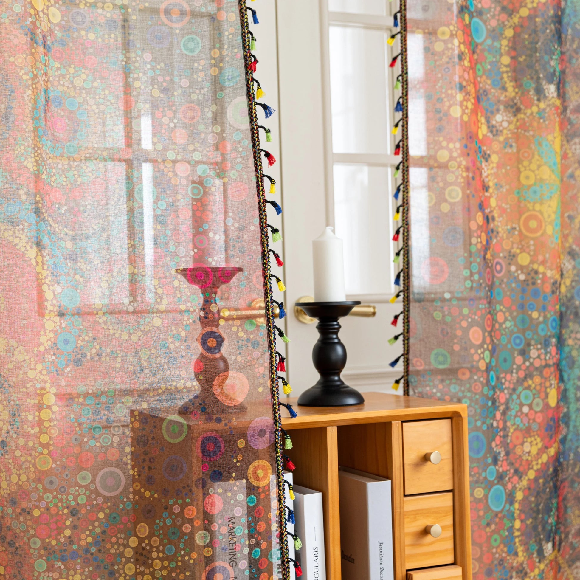 Infuse your home with artistic vibrance using this bohemian sheer curtain, adorned with an intricate mandala and floral pattern in bold reds, yellows, blues, and oranges. Made from lightweight, airy fabric, it filters natural sunlight beautifully while preserving privacy. Perfect for living rooms, bedrooms, or creative spaces, this decorative curtain creates a warm, inviting ambiance.