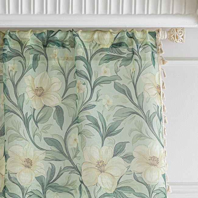 Floral Sheer Curtains with Green Leaves and Cream Blossoms ¨C Bring the beauty of nature indoors with these elegant sheer curtains featuring a delicate pattern of lush green foliage and soft cream flowers. The airy, lightweight fabric allows natural light to filter through while adding a touch of privacy. Finished with charming tassel trim, these curtains are perfect for brightening living rooms, bedrooms, or garden-inspired spaces, creating a fresh and inviting atmosphere.
