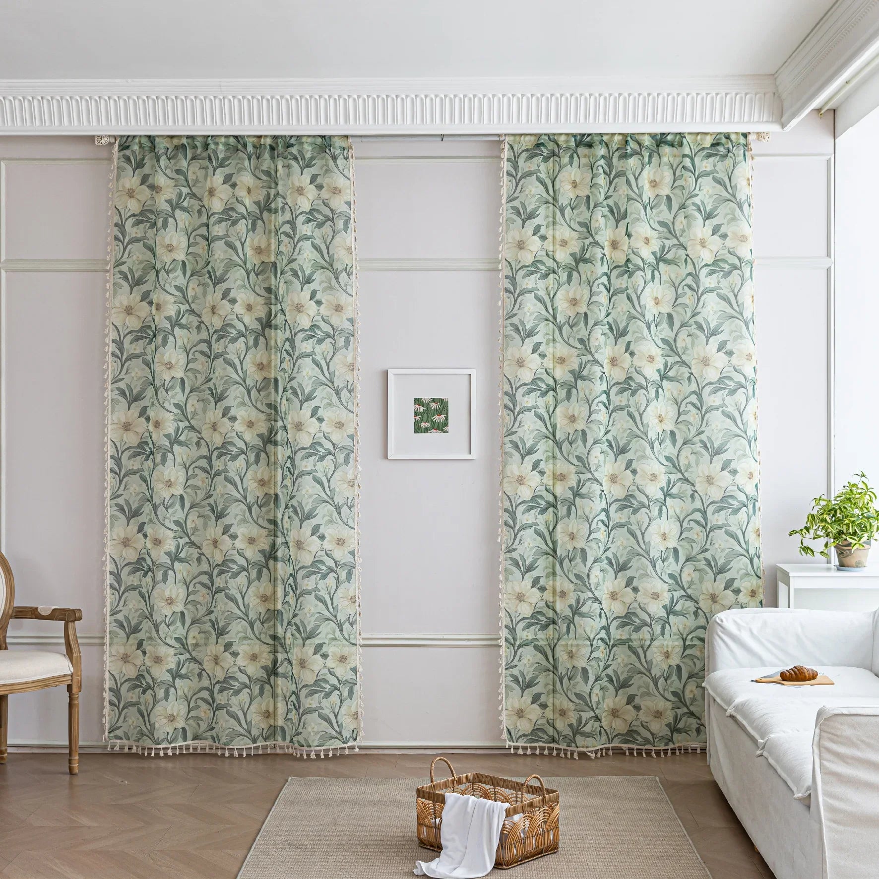 Floral Sheer Curtains with Green Leaves and Cream Blossoms – Bring the beauty of nature indoors with these elegant sheer curtains featuring a delicate pattern of lush green foliage and soft cream flowers. The airy, lightweight fabric allows natural light to filter through while adding a touch of privacy. Finished with charming tassel trim, these curtains are perfect for brightening living rooms, bedrooms, or garden-inspired spaces, creating a fresh and inviting atmosphere.
