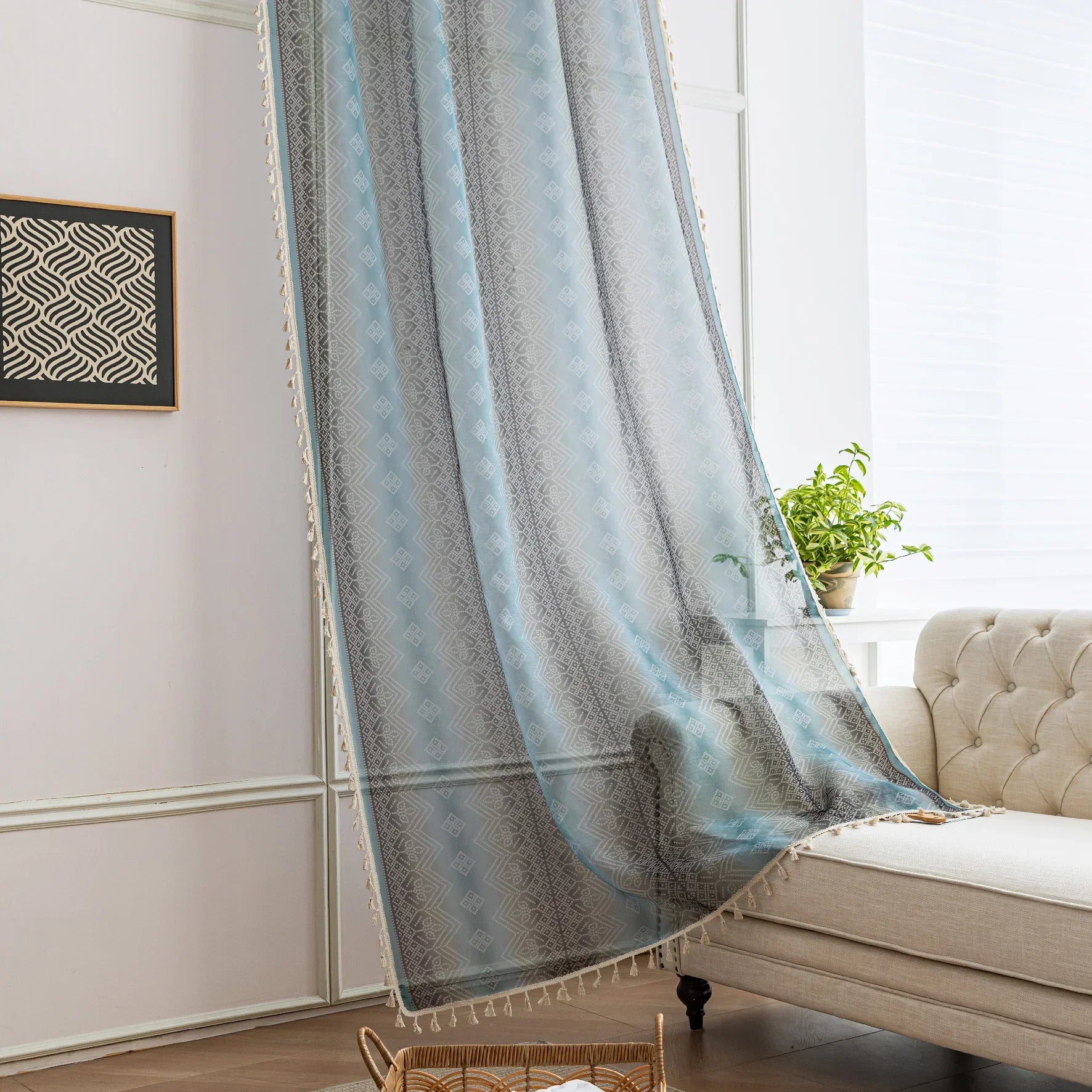 Light Blue Sheer Curtains with Subtle Geometric Pattern ¨C Add a serene and airy touch to your home with these elegant sheer curtains in a soft light blue hue, adorned with a delicate geometric design. The lightweight fabric gently diffuses natural sunlight, brightening your space while maintaining privacy. Finished with charming tassel edges, these curtains are perfect for living rooms, bedrooms, or coastal-themed interiors, creating a calm and stylish ambiance.

